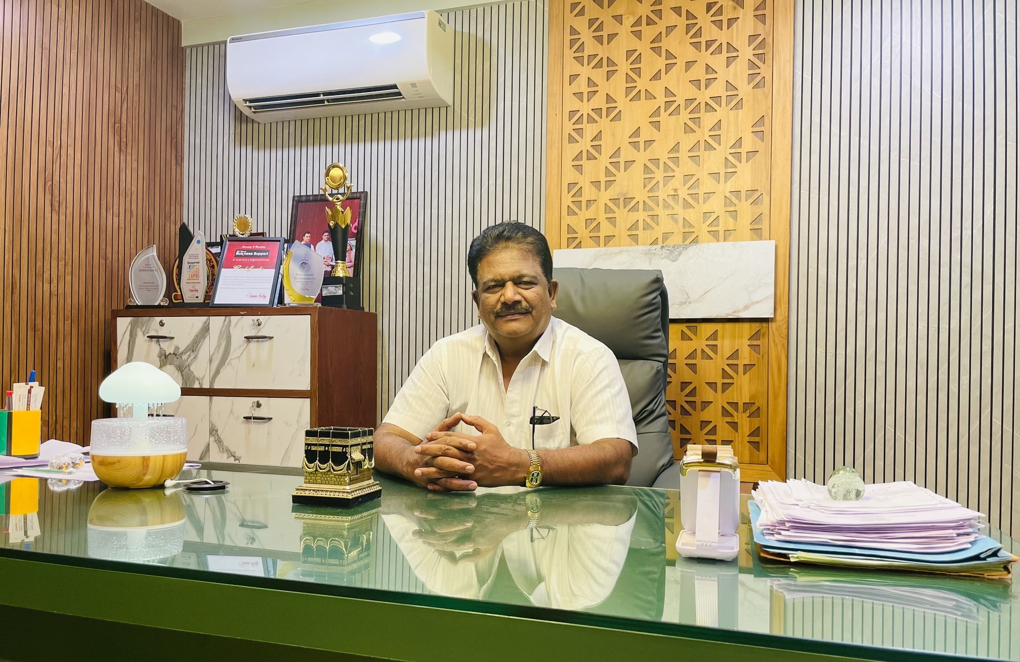 Basheer, a seasoned entrepreneur, began his business journey in North Karnataka, focusing primarily on grocery products. His efforts led to the successful establishment of a wholesale distribution network in Gangawathi and various locations within the Raichar district, adopting a direct sourcing approach by procuring products directly from their production places. Expanding his ventures, Basheer ventured into the hypermarket sector, creating a conglomerate of supermarkets and hypermarkets across Karnataka. As the Managing Director of V A Hypermarket, he oversees the sourcing process, ensuring direct procurement from manufacturing factories and timely delivery to NABH Hypermarket. Basheer's unwavering commitment to delivering uncompromising quality is reflected in NABH in Kuthuparamba, Kannur, where customers can indulge in superior products and a premium shopping experience. His entrepreneurial journey has been shaped by his unwavering dedication to providing quality and customer satisfaction, which have played a vital role in his remarkable success in the business landscape.